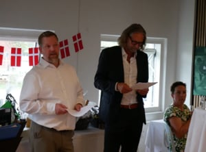 UNIwise co-founders, Steffen Skovfoged and Rasmus Blok holding a speech at a company event in Aarhus, Denmark