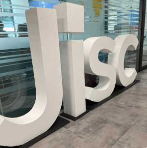 Jisc logo in large, physical letters at an office