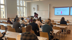 Breakout session at WISEcon24 with multiple attendees
